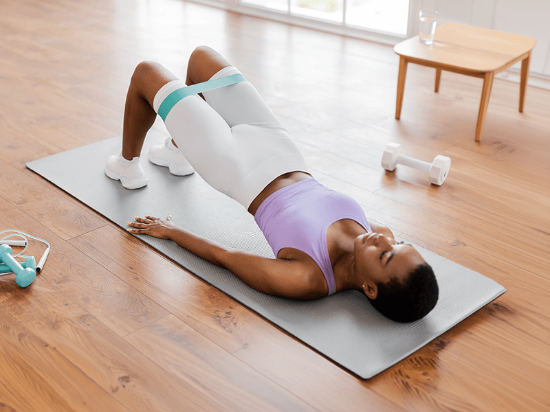 woman performing Patellofemoral pain syndrome exercises